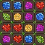 Fargerike perler i rødt, blått, rosa, grønt og gult, arrangert i et rutenett med mørk bakgrunn