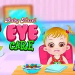 En illustrasjon av en liten jente ved et bord med fargerike boller og en lege ved siden av, med teksten Baby Hazel Eye Care i bakgrunnen