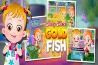 Wow!! Baby Hazel er glad for å ha en gullfisk som heldigvis faller fra
