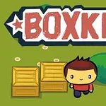 Tegneseriefigur ved siden av to trekasser, med ordet BOXKID i stor tekst over