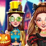 To kvinner i fantasifulle kostymer, den ene med en topphatt og den andre med katteører, står foran et lysspill omgitt av halloween-dekorasjoner som et gresskar og spindelvev