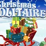 En slede fylt med julegaver i snølandskap, med teksten Christmas Solitaire i bakgrunnen