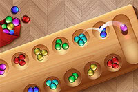 Nyt det eldgamle spillet Mancala