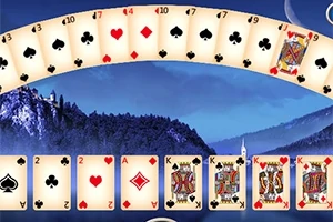 En bue av spillkort over et landskap med mørke skogkledde fjell og en nattehimmel i bakgrunnen