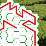 Et heksagonalt rutenett med røde og grønne linjer over en bakgrunn av frodig grønt landskap