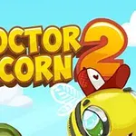 Fargerik illustrasjon med teksten Doctor Acorn 2 i gule bokstaver, over en animering av en bie med store øyne og en legehatt