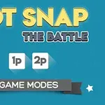 Tekst med Dot Snap The Battle øverst, med valgknapper for 1p og 2p samt en banner med Game Modes mot en blå bakgrunn
