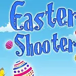 Fargerike påskeegg og sommerfugler foran en skyet blå himmel med teksten Easter Shooter