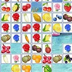 Frukt og blomster i ulike farger og former er arrangert i et rutenett på en blå bakgrunn