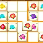 Brett med blomsterikoner i forskjellige farger arrangert i rutenett