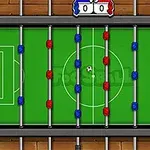 Bordfotballspill sett ovenfra med røde og blå spillere på stenger