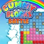 Fargerik spillgrafikk med blokker, en regnbue øverst og teksten Gummy Blocks Battle omgitt av skyer