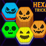 Hexa Sort Trick or Treat Stable brikker med halloween-ansikter i forskjellige farger ved siden av en hånd med et sår under tekst som sier Hexa Sort Trick or Treat