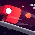 Et rødt, kubelignende objekt med en hvit sirkel i midten beveger seg raskt gjennom et mørkt rom med oransje sirkler og teksten HUNGRY BOX øverst til høyre