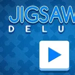 Teksten Jigsaw Deluxe med et puslespill-brikke-ikon på en blå bakgrunn med en stor hvit spilleknapp