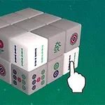 En terningblok med mahjong-brikker og en grafisk hånd som peker på en av brikkene, mot en grønn bakgrunn