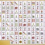 Fliser med kinesiske tegn og symboler arrangert i et mønster på en dekorativ bakgrunn