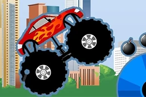 Rød monstertruck med flammemønster hopper foran bysilhuett med høye bygninger