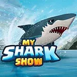 En hai hopper ut av vannet foran teksten My Shark Show med fjell og en blå himmel i bakgrunnen