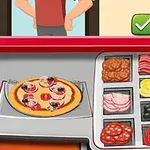 En pizzabenk med ulike ingredienser og en pizza klar til servering, med en person i bakgrunnen
