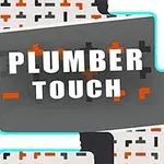 Tekst PLUMBER TOUCH i store bokstaver med et bakteppe av rørdesign og blokker i grått, blått og oransje