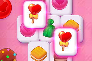 Hjerteformede slikkepinner og andre søtsaker på rosa bakgrunn med Mahjong-brikker