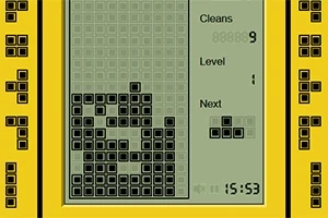 En gul, retro elektronisk enhet med et skjermbilde som viser stablede blokker og spillstatistikk