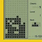 En gul, retro elektronisk enhet med et skjermbilde som viser stablede blokker og spillstatistikk