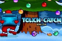 Julenissen har lite julepynt  under  for spillet Touch & Catch: Santa