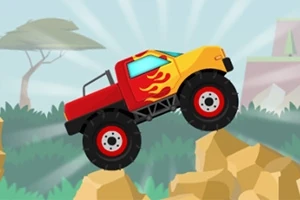 En rød og gul monstertruck med flammedesign kjører over steiner i et tegneserielandskap