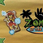 Silhuetter av palmetrær og en hevet hånd, med teksten Zombies at the Beach ved siden av en tegnet zombiefigur i hawaii-inspirerte klær