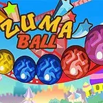 Fargerike kuler i en bane med teksten Zuma Ball over, mot en bakgrunn med fornøyelsesparktema